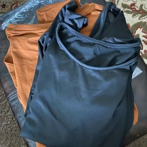 Body suits. 2- 1 rust colored and black XL